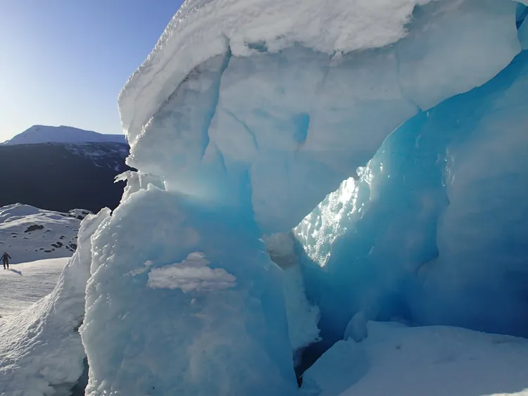 Unsplash image for single hourglass on wooden table dramatic light